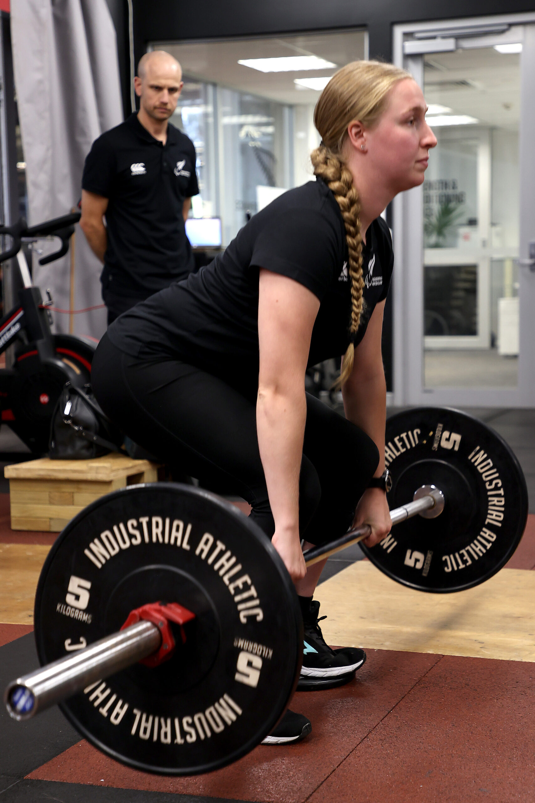 Para athlete Siobhan Terry trains in the gym with her coach Jack Cooper