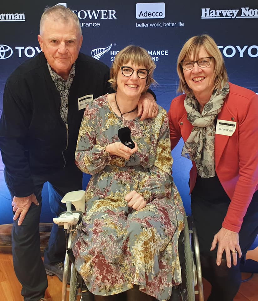 Stacey with her parents at the Celebration Project event