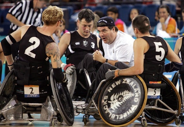 Coach Grant Sharman addressing to his Wheel Blacks team