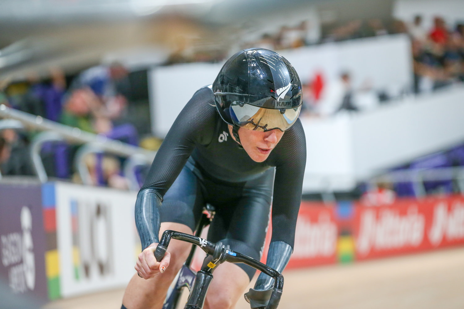 dramatic shot of Nicole front on rounding a corner