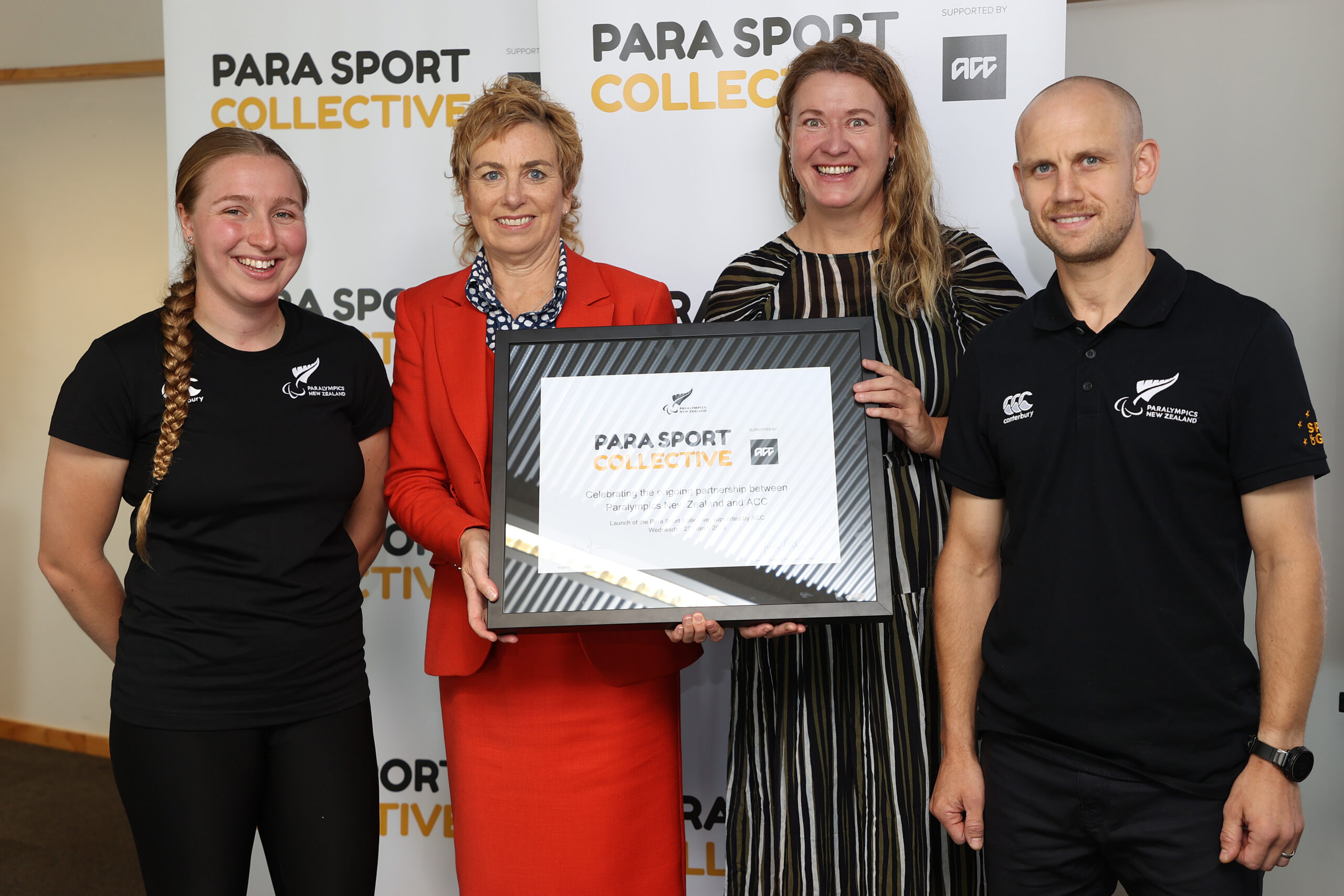 (L-R) Para athlete Siobhan Terry, Megan Main, ACC, Chief Executive, Fiona Allan, Paralympics New Zealand Chief Executive  and Jack Cooper, Paralympics New Zealand, Para Cycling Development coach holding Para Sport Collective framed commemorative certificate